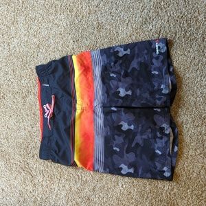 Gerry camo and bold orange swim trunks